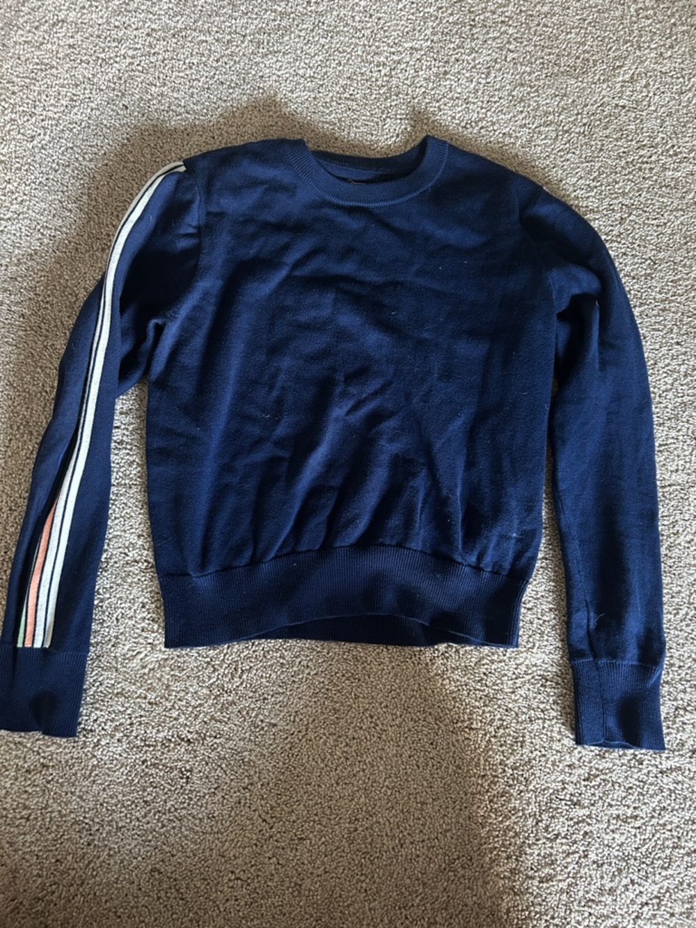 Great condition navy sweater with stripes on side